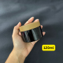 Luxury 100ml 120ml 150ml 200ml 250ml Black PET Jar with Round Plastic Bamboo Wood Plastic Cosmetic Cream Jar.
